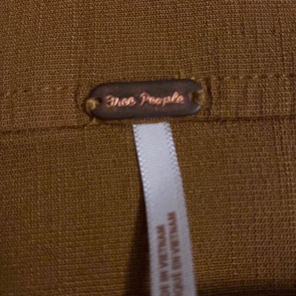 Free people skirt mini tan color  size 4